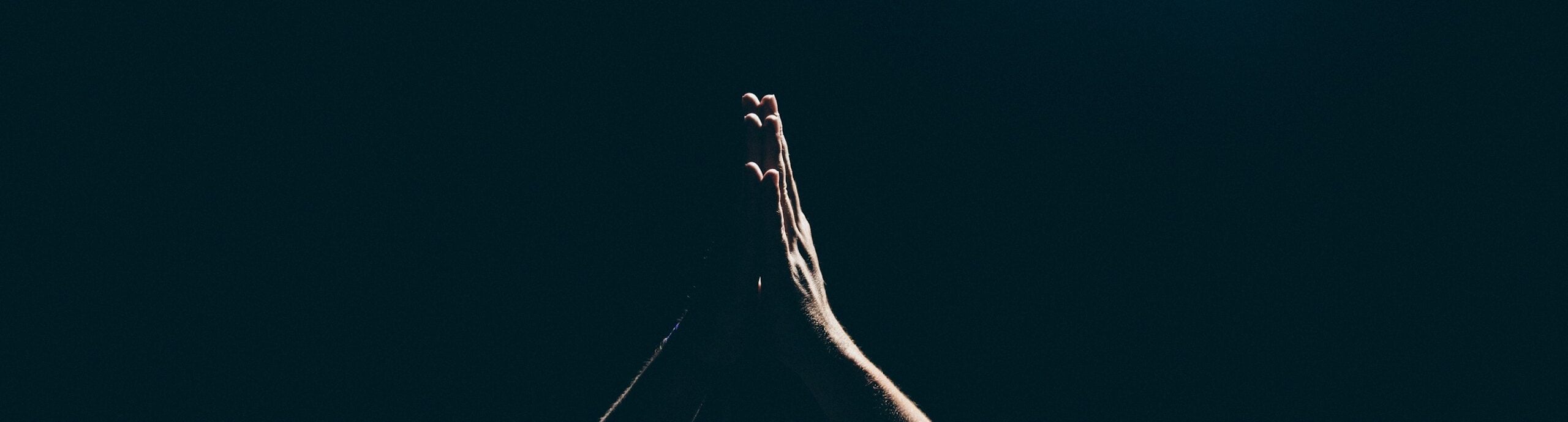 person raising arms
