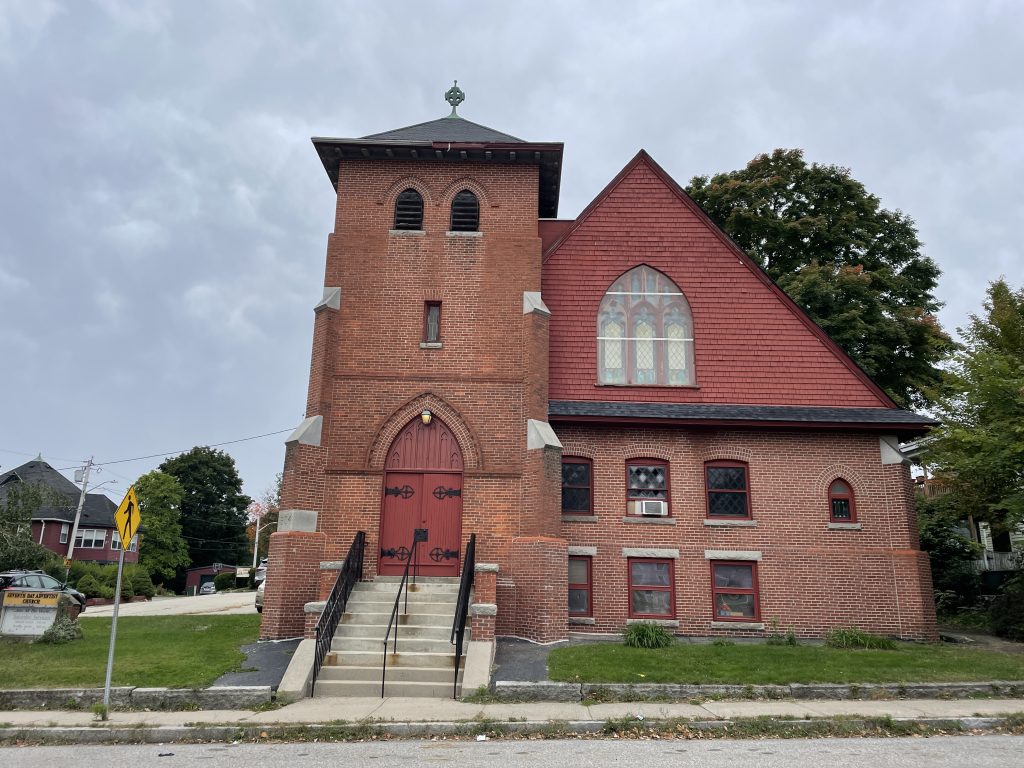 Amesbury Seventh-day Adventist Church, a red brick church on Main Street