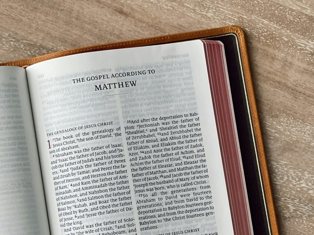 Bible open to The Gospel According to Matthew