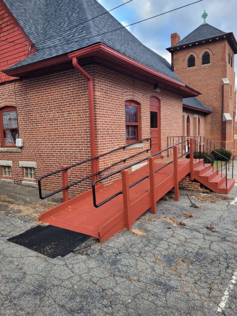 Wooden access ramp to a side entrance of the church