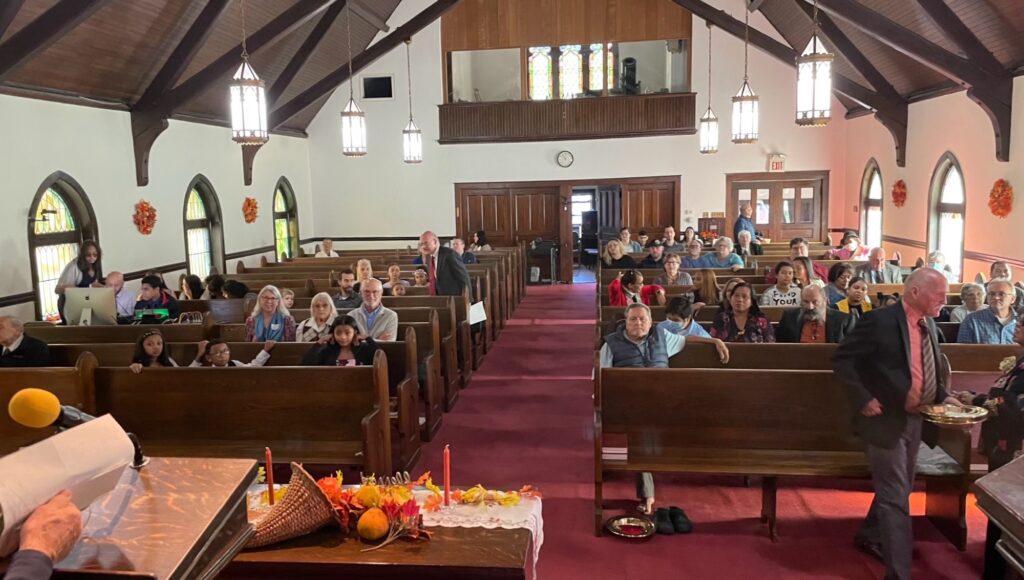 Congregation gathered for worship in the Amesbury Seventh-day Adventist Church sanctuary