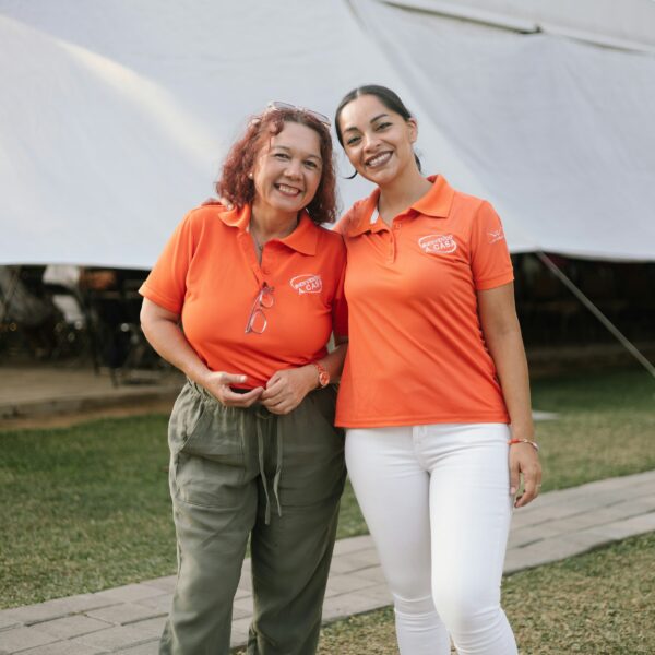 a couple of women standing next to each other