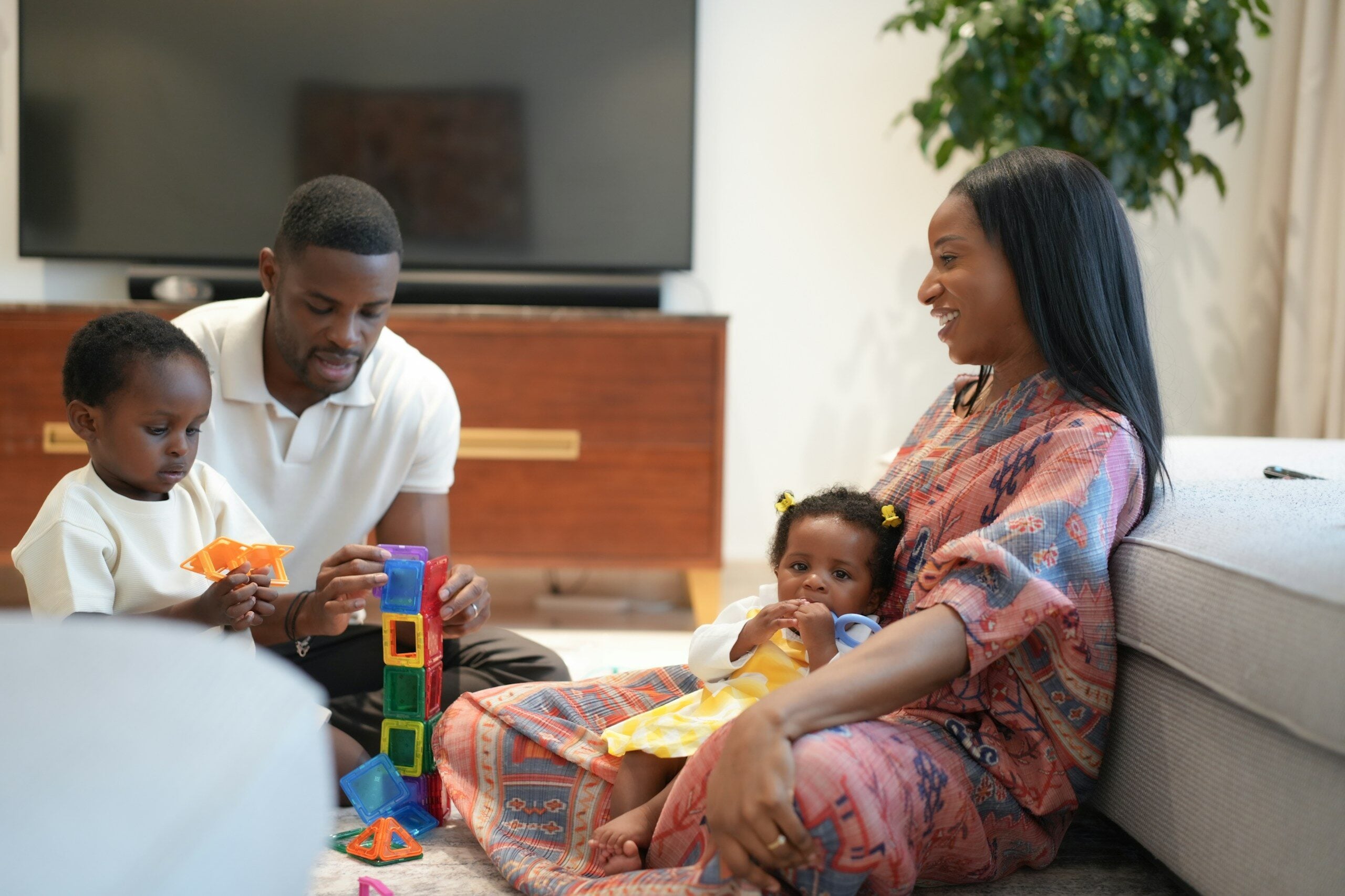 A family plays and spends time together.