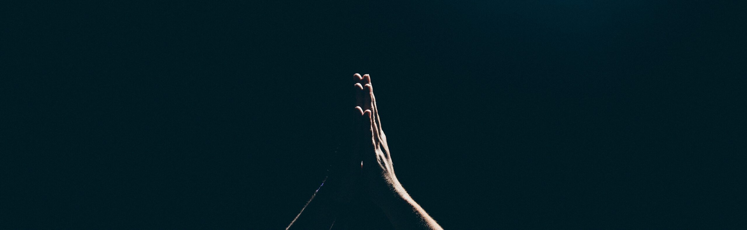 person raising arms
