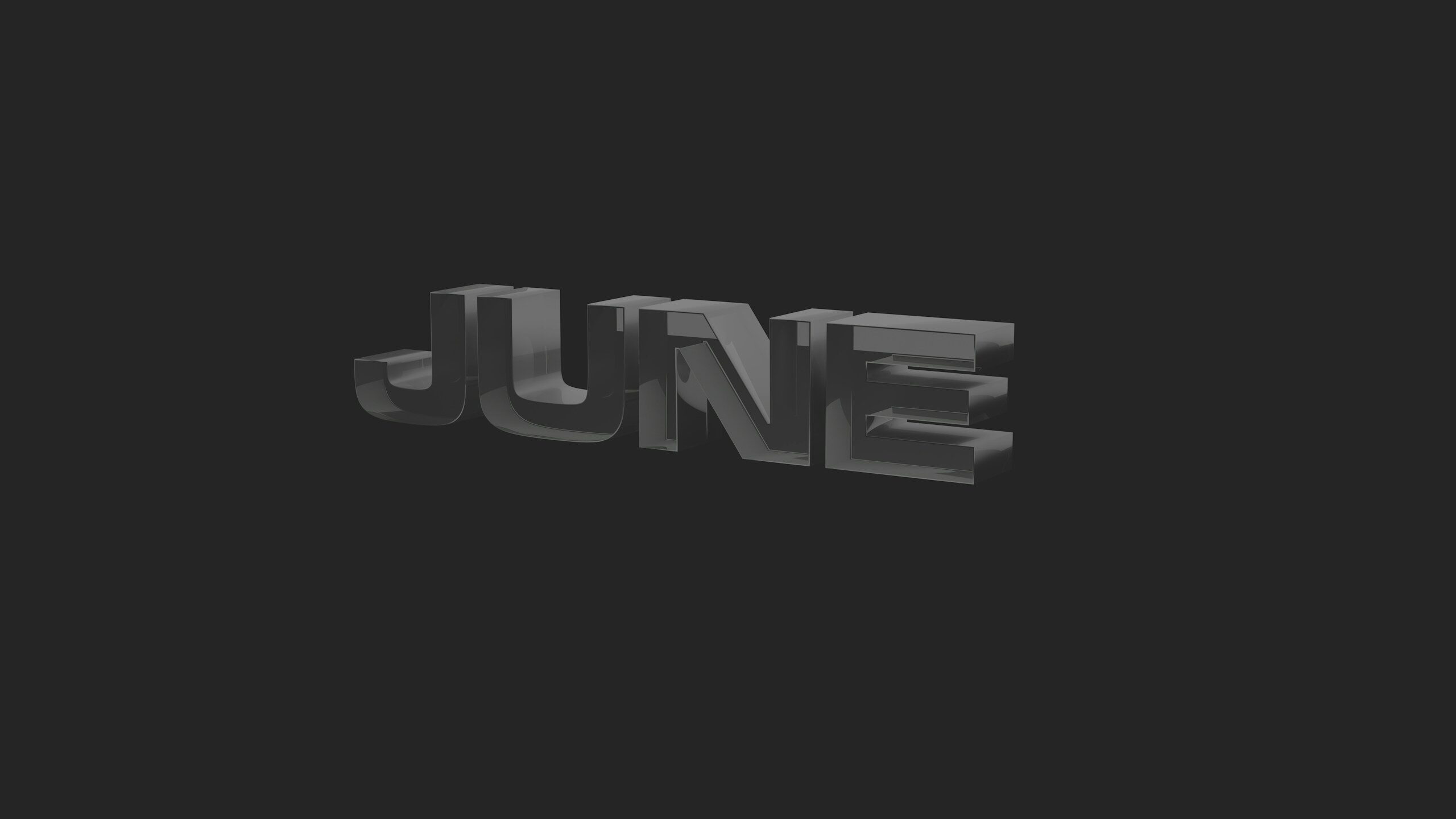 A black and white photo of the word june