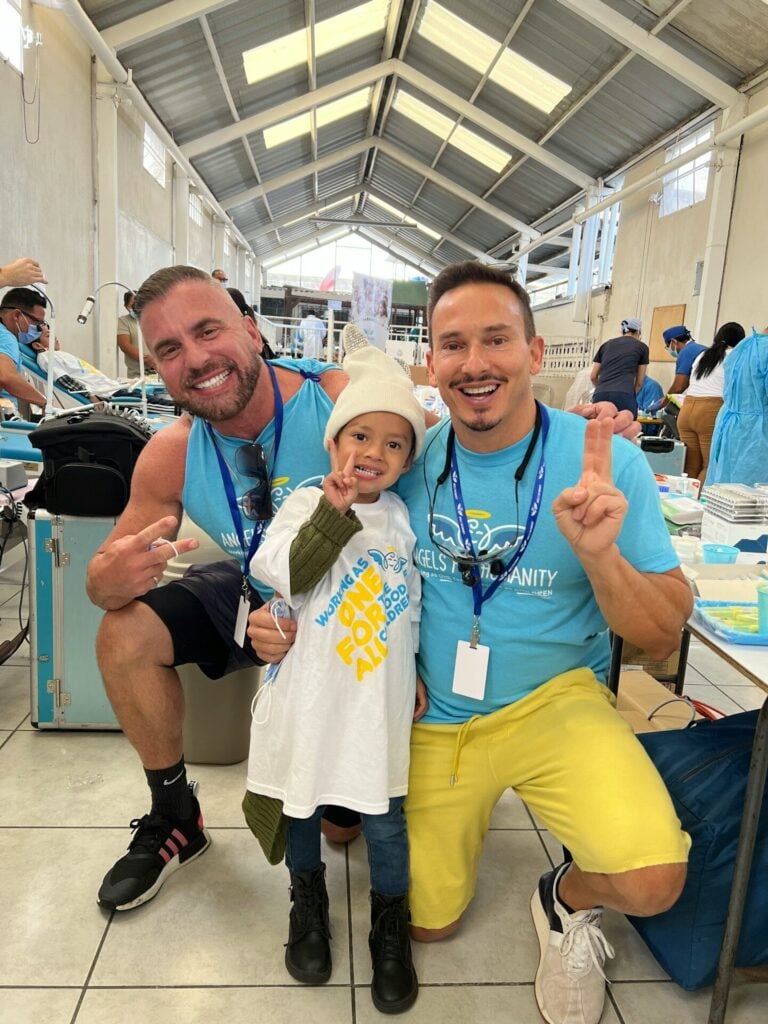 a person and a boy posing for a picture