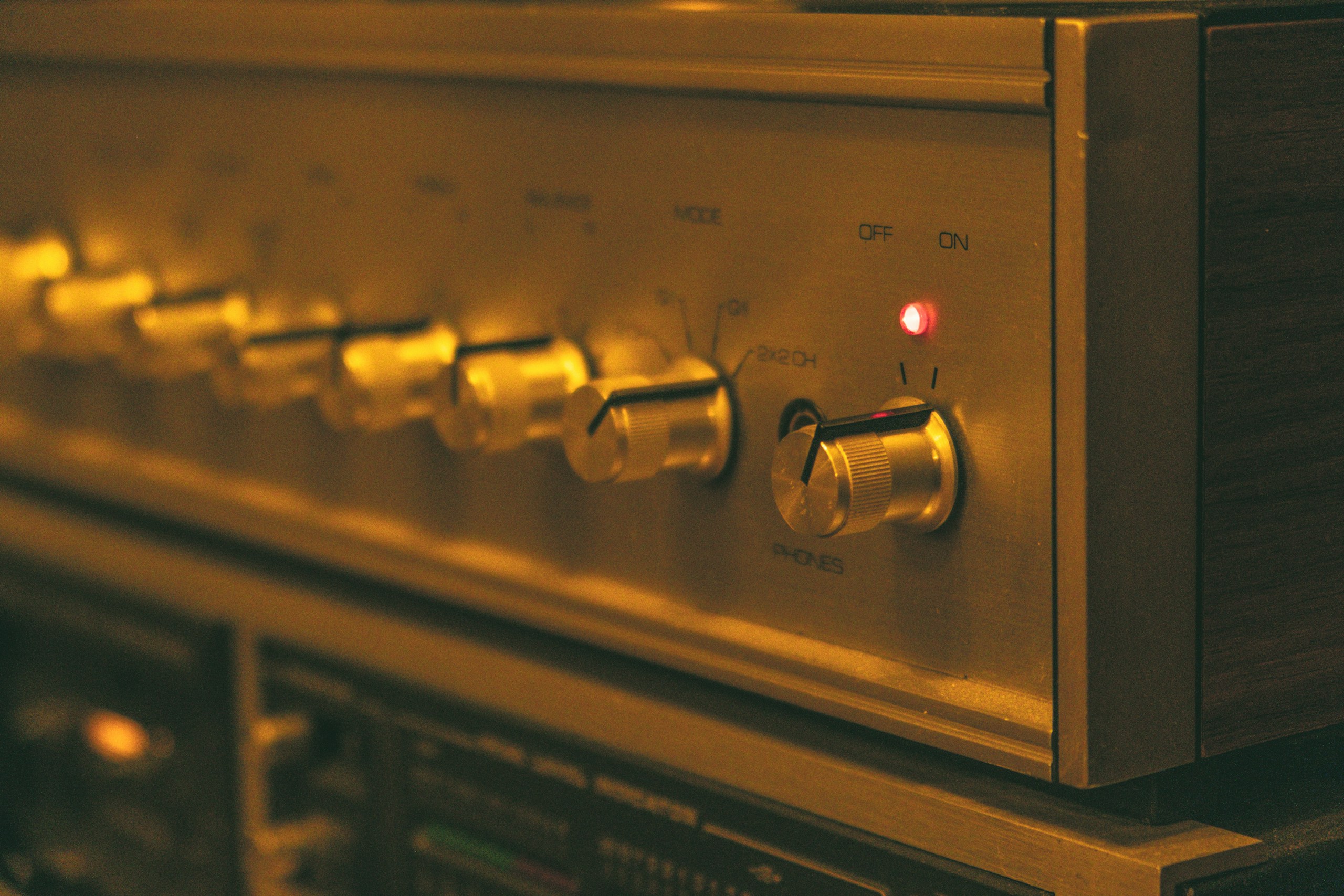a close up of a stereo system with knobs