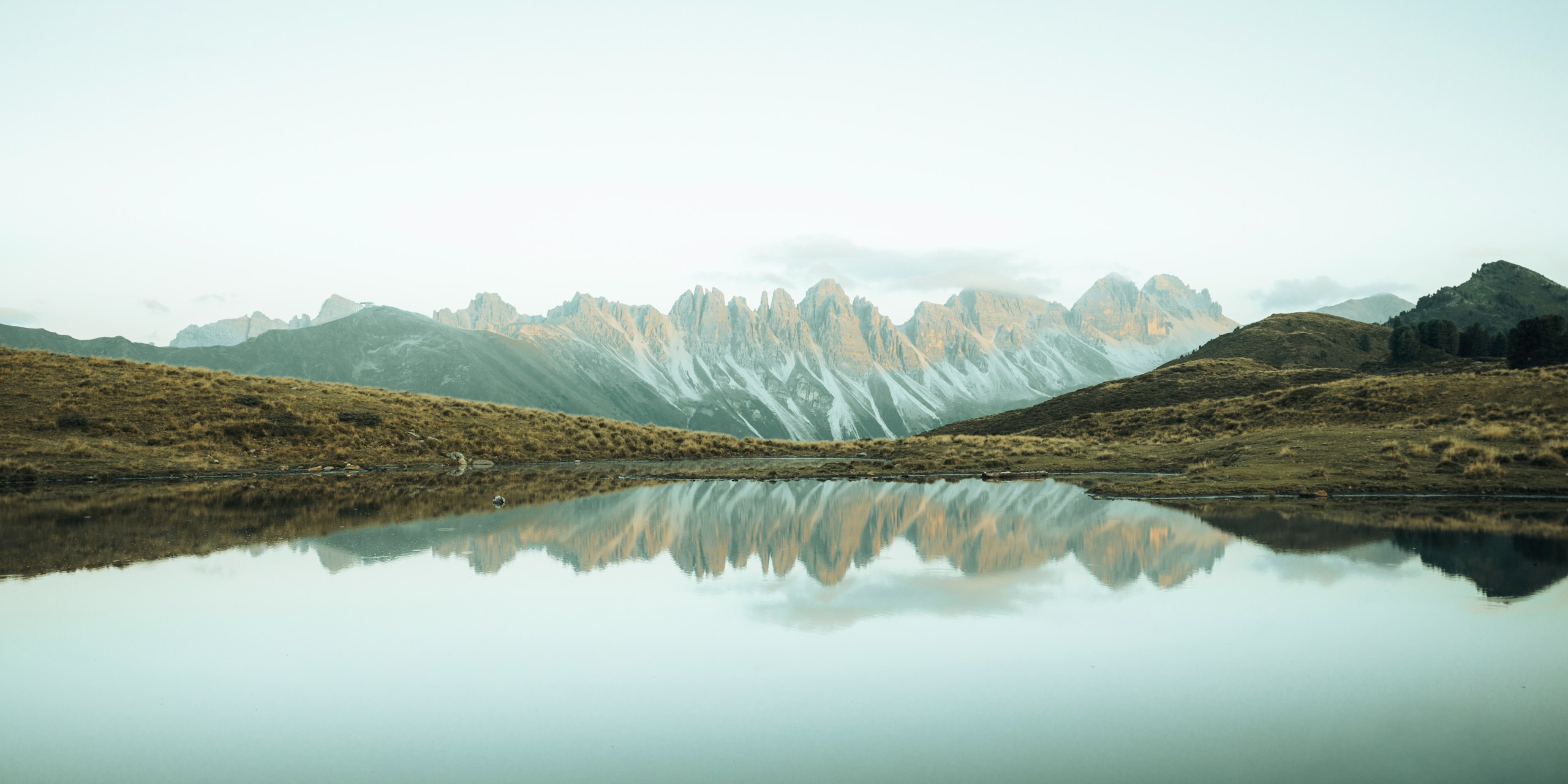 Mountain range reflected in a calm lake
