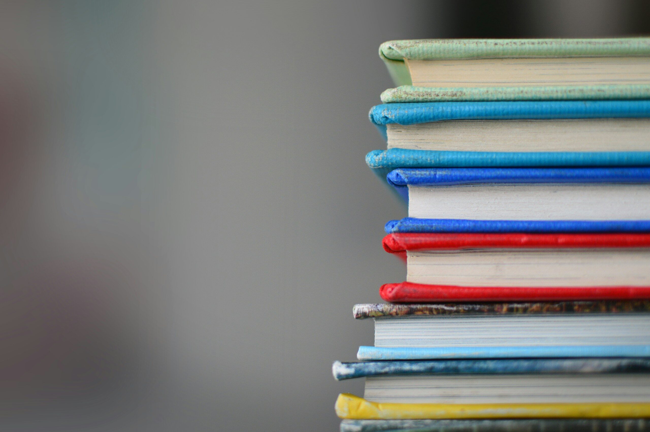shallow focus photography of books