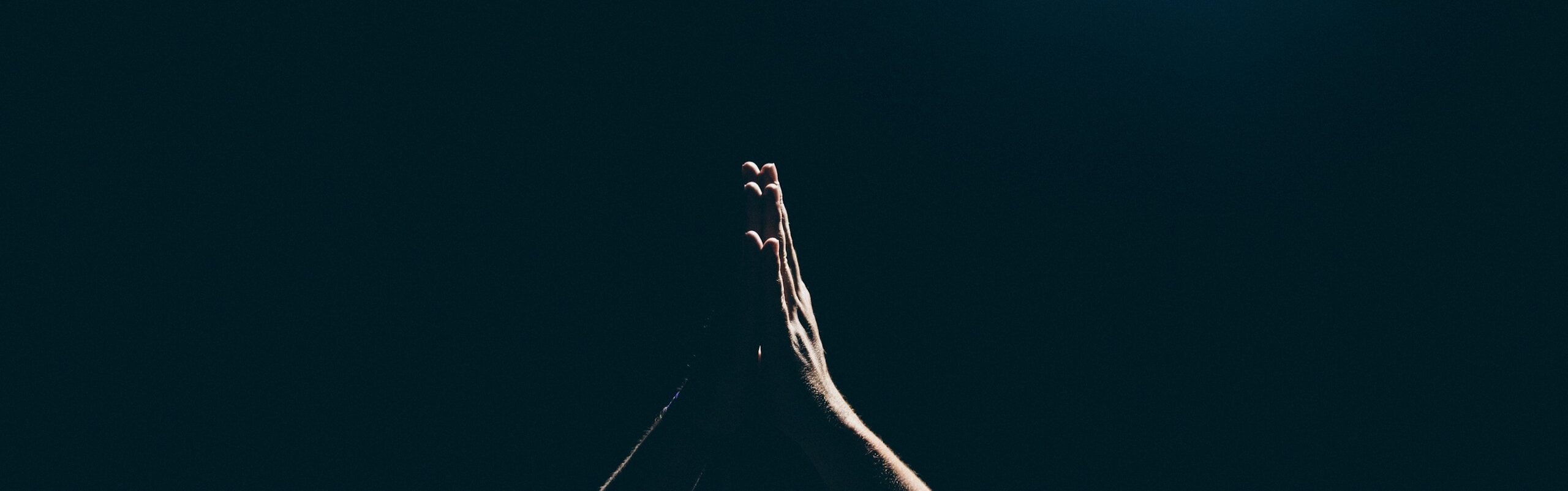 person raising arms