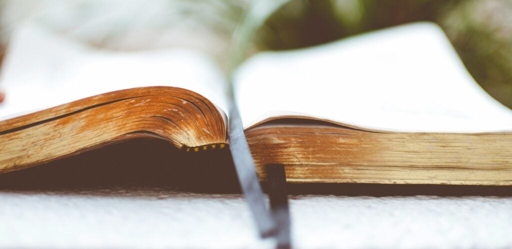 open book on white surface