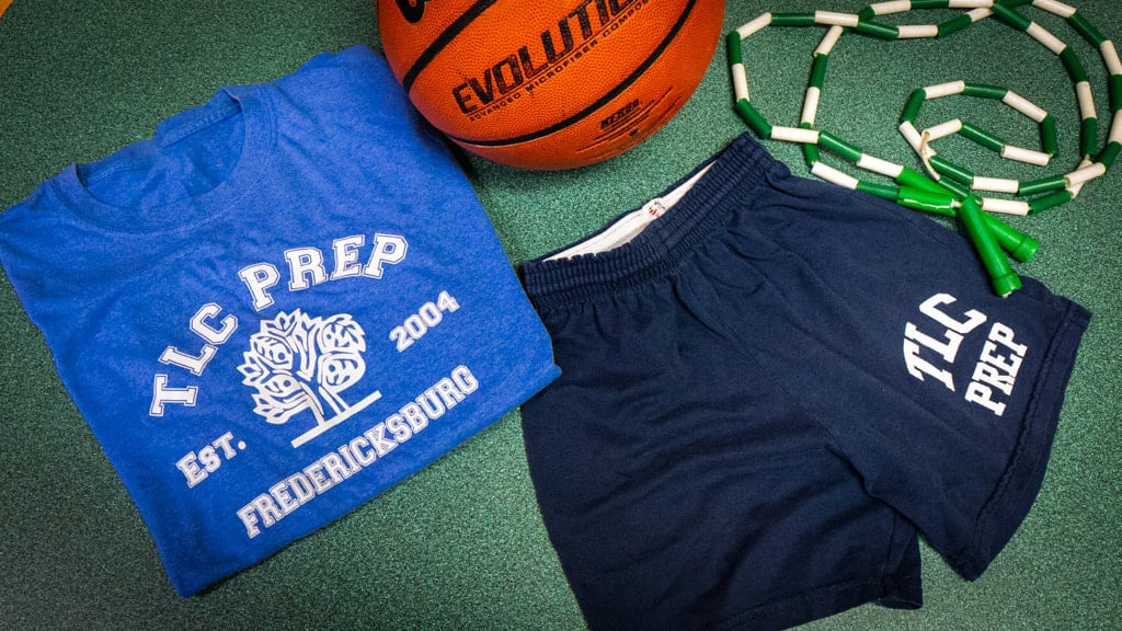 TLC Prep Friday shirt, gym shorts, basketball, and jump rope