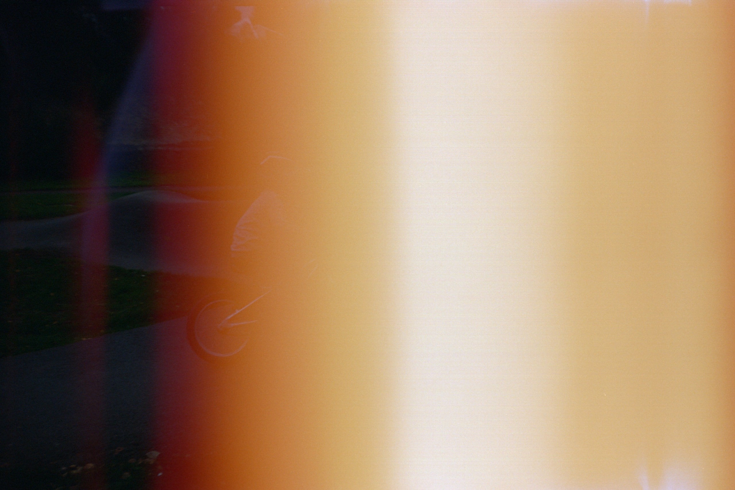 Abstract light leak with blurred background elements