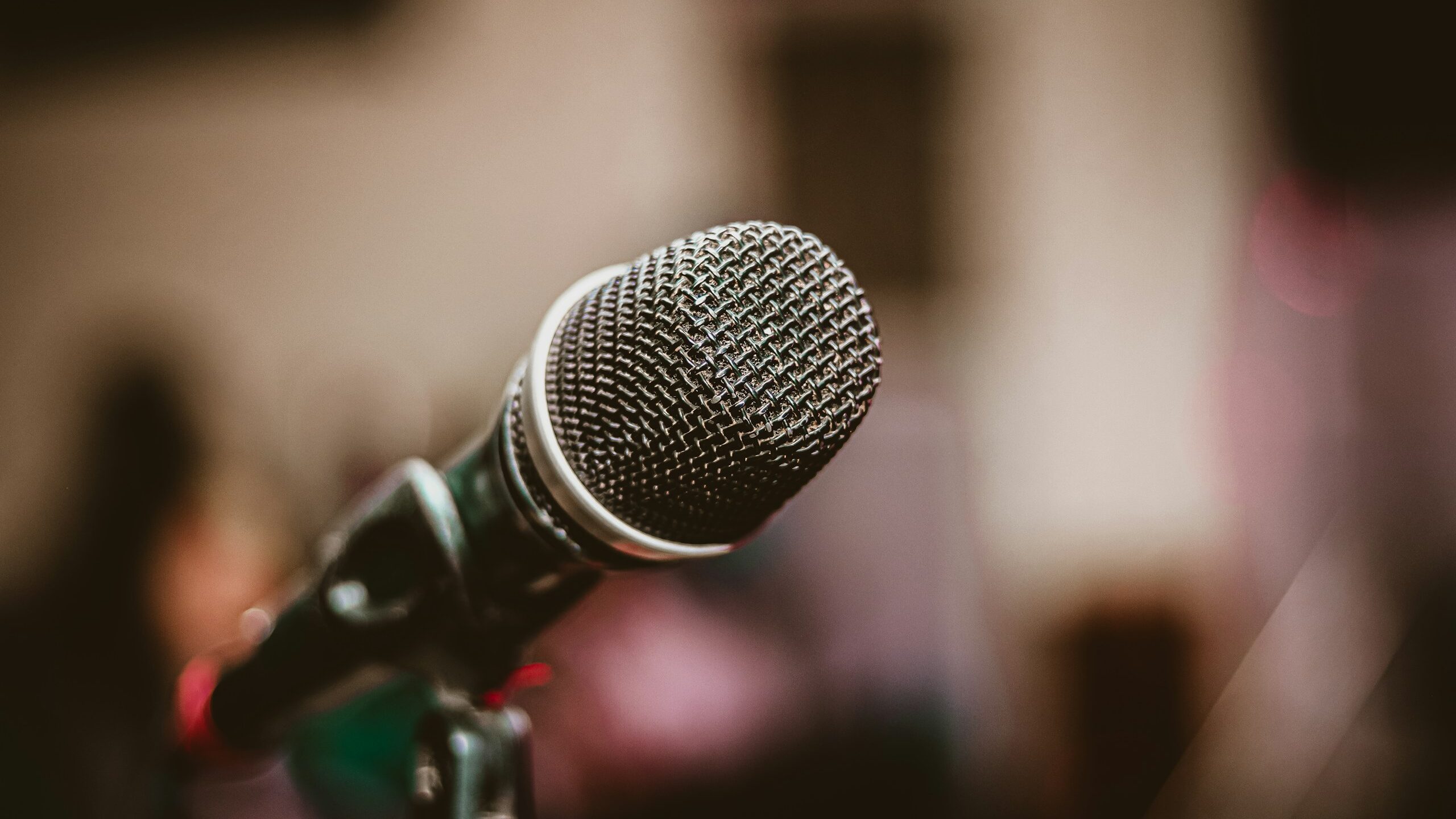 black microphone on black microphone stand