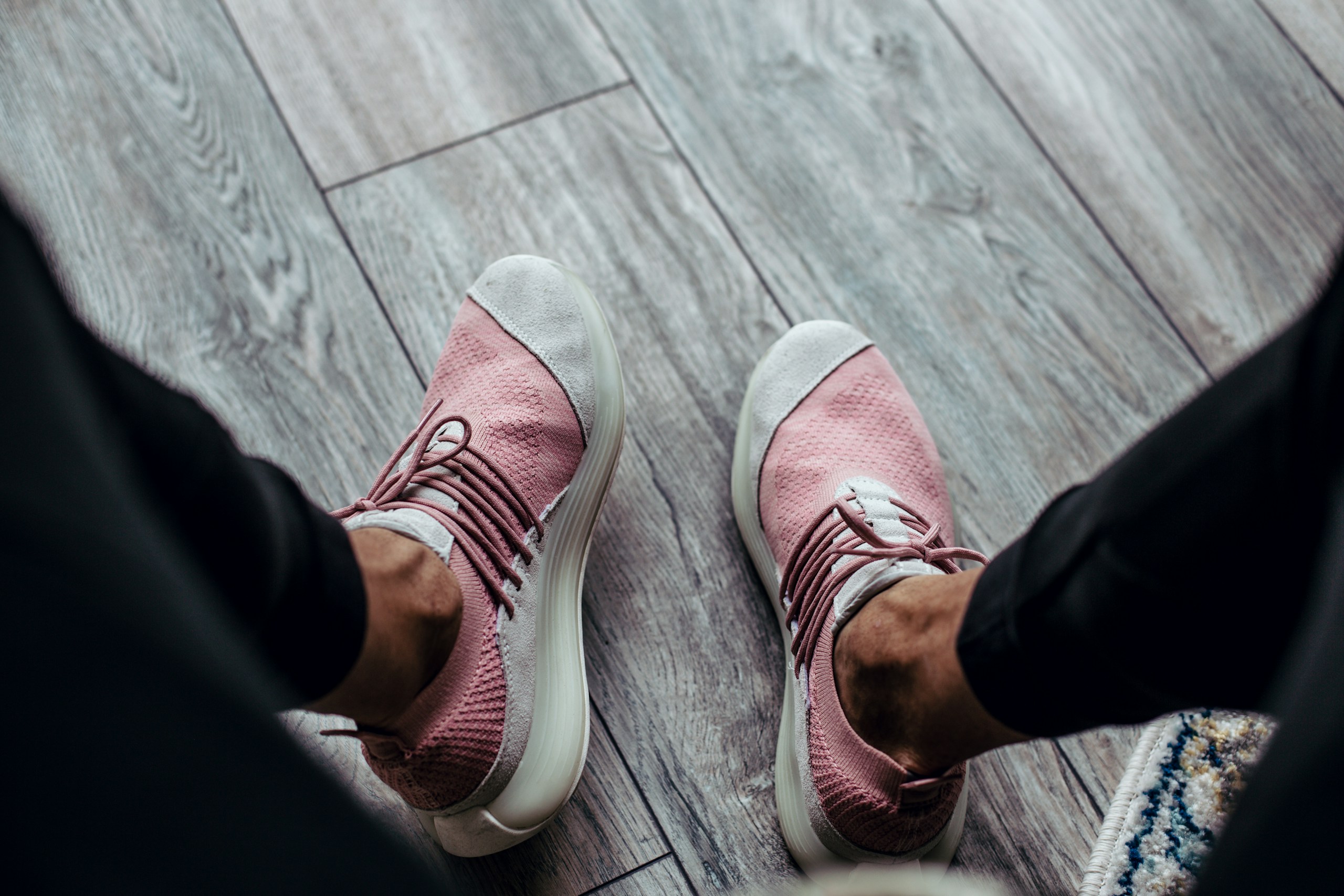 person wearing pink shoes