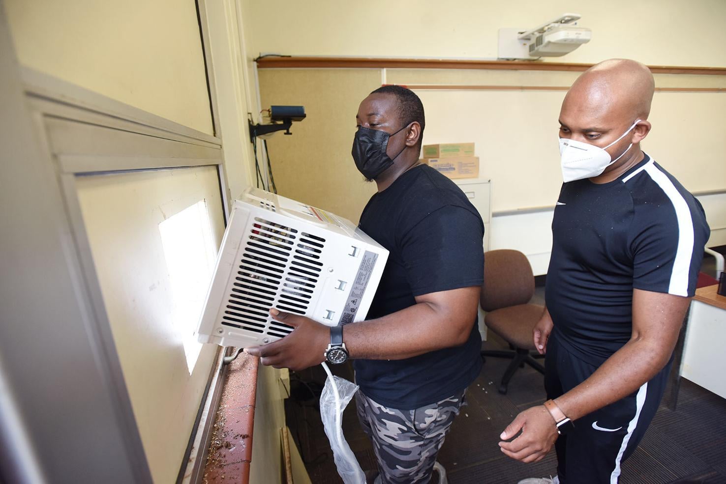 Pastors donate air conditioners to Michigan middle school