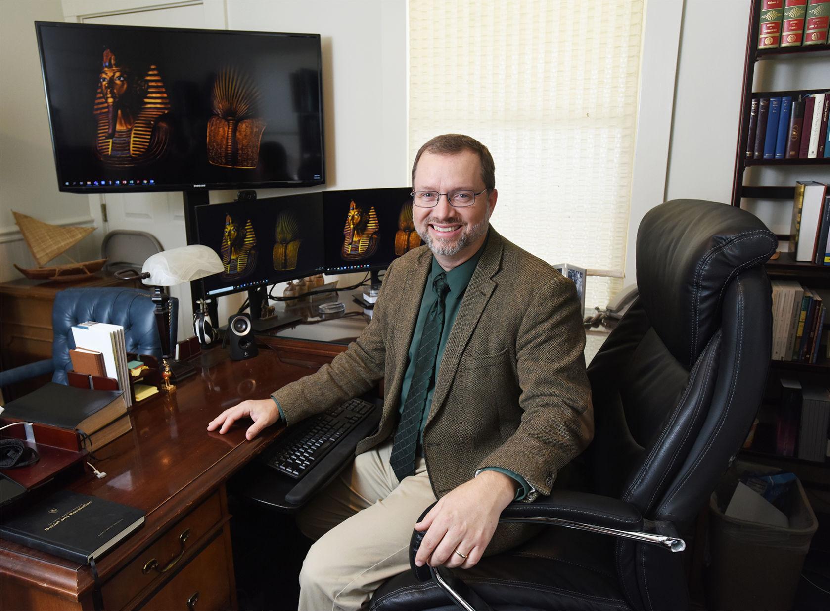 L.S. Baker pieces together work with ancient Egyptian hieroglyphics