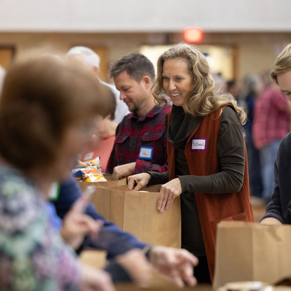 Volunteers Pack Thousands of Care Packages for Inmates