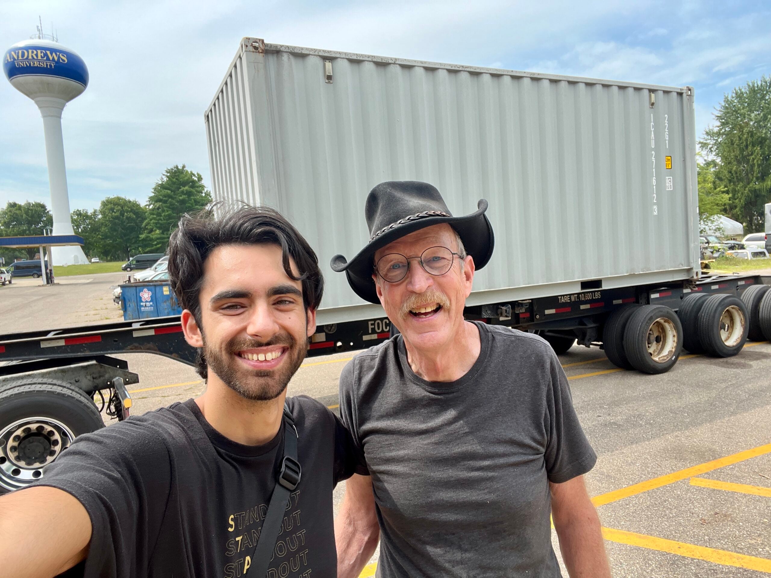 Niki Djordjevic and Carey Carscallen stand in front of the completed container home on the day it was shipped.