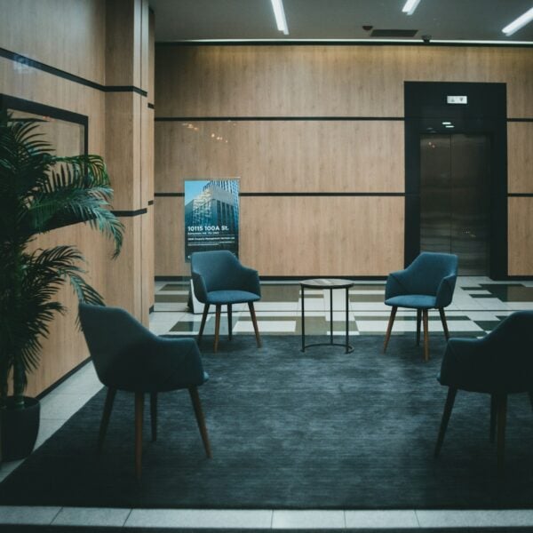 a couple of chairs that are in a room