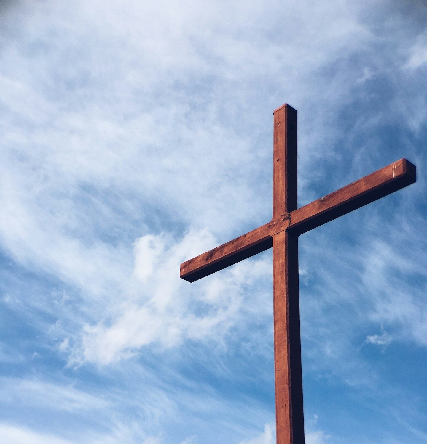 a brown wooden cross