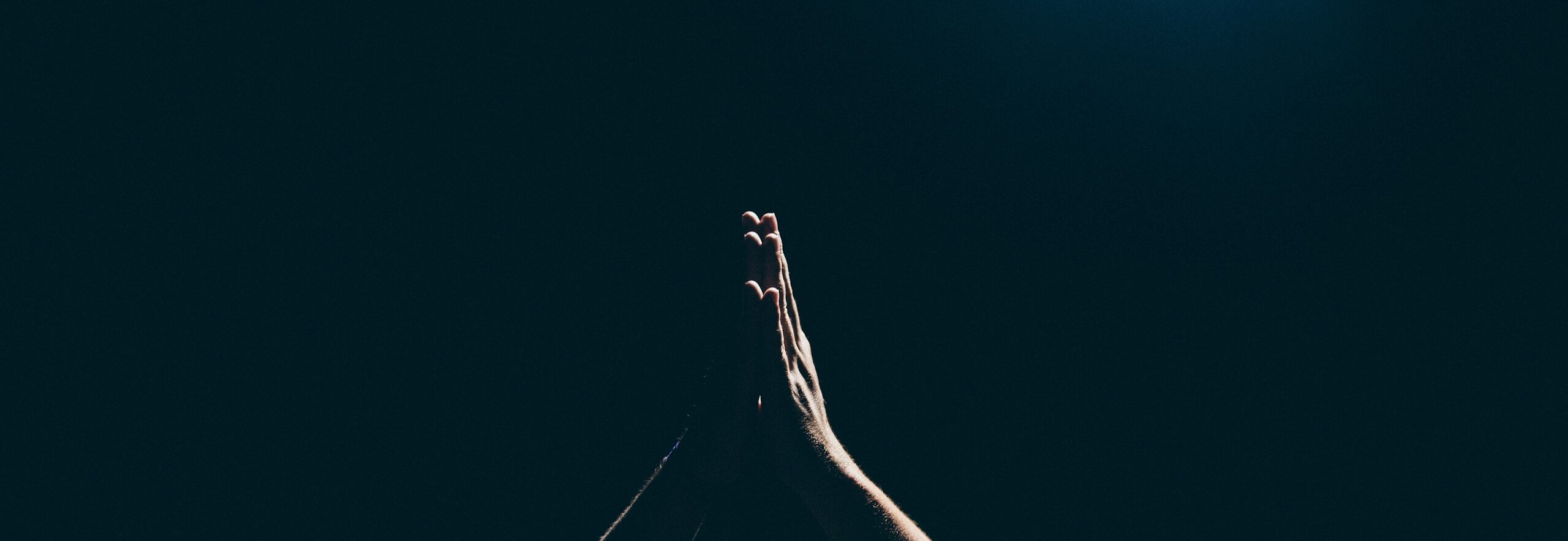 person raising arms