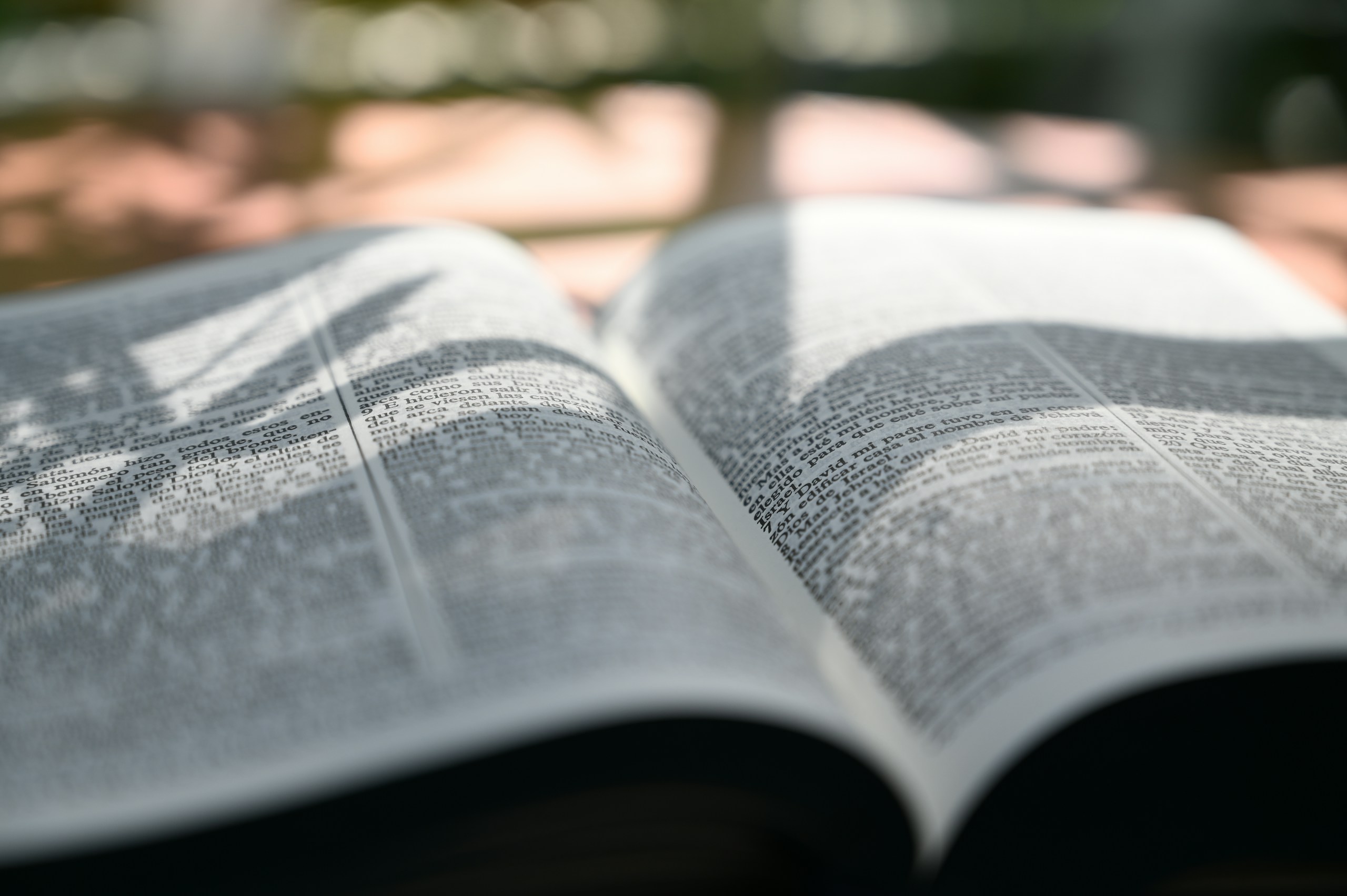 an open book sitting on top of a table