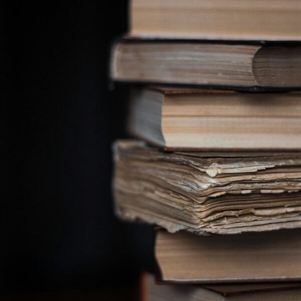 stack of books on black background