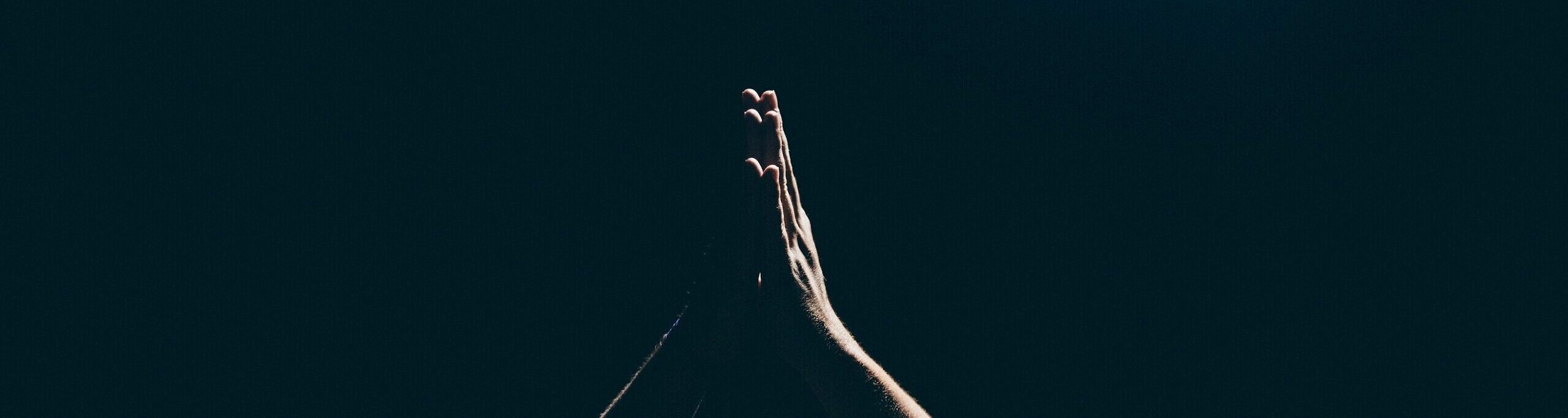 person raising arms