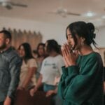 a person with the hands up