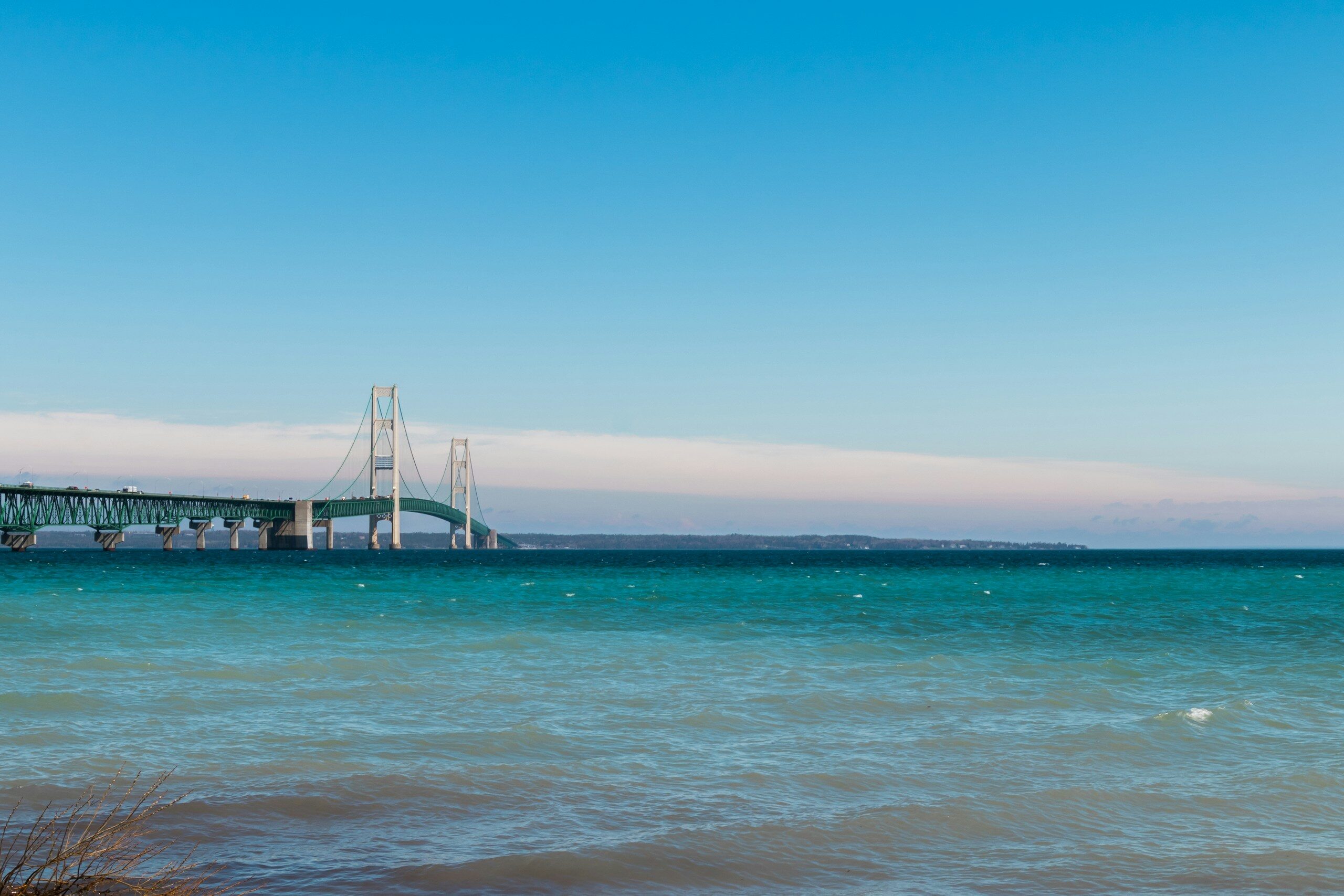 bridge over the sea during daytime
