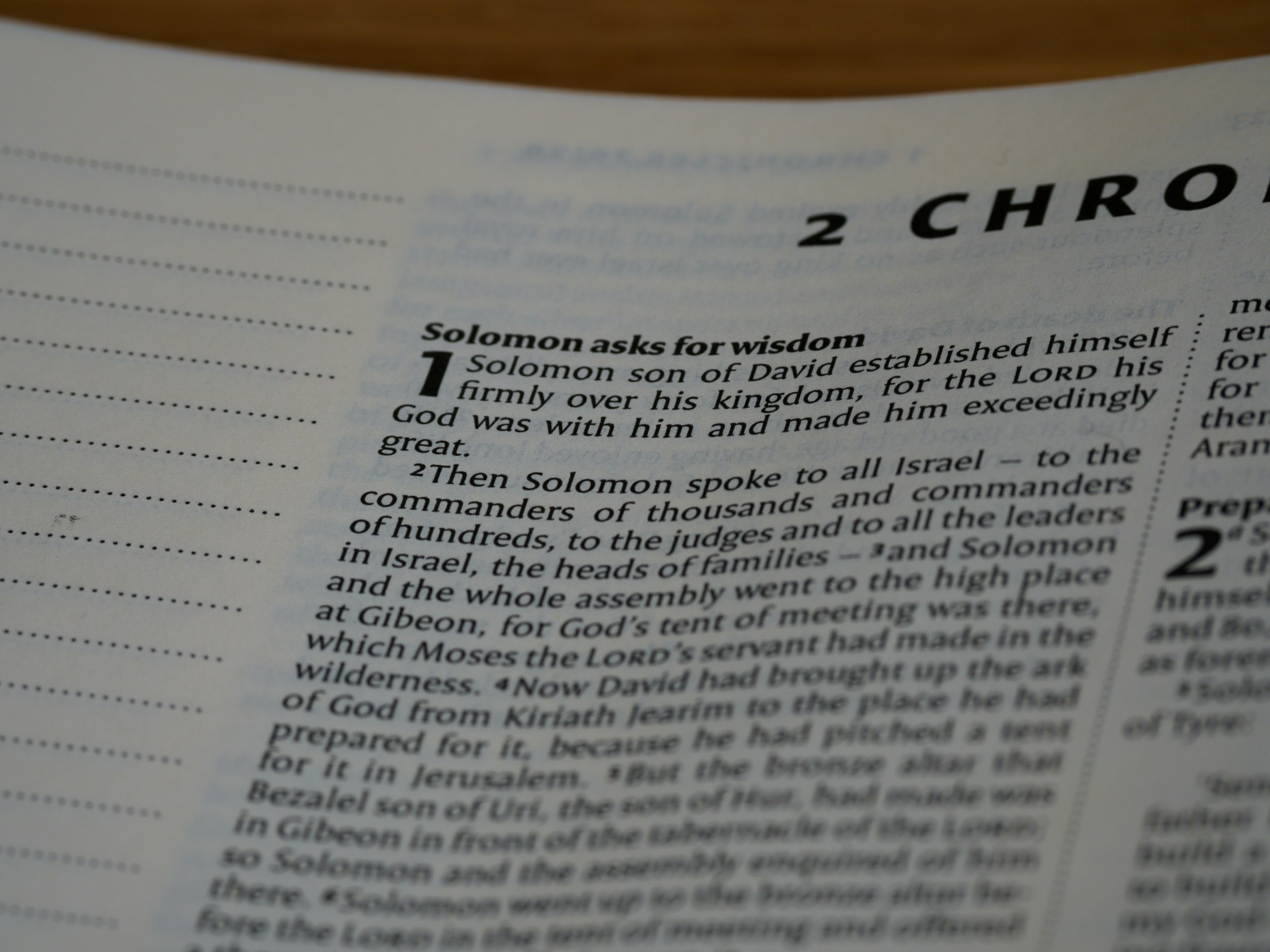 a close up of a book with a page in it