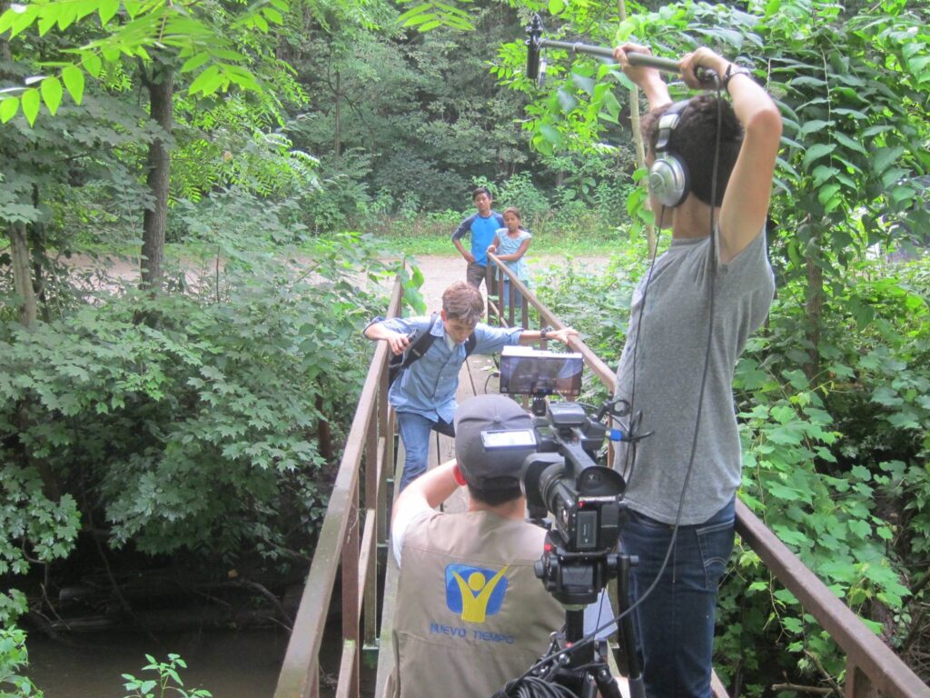 Film crew of The Mysterious Note captures a scene involving three of the film’s actors.