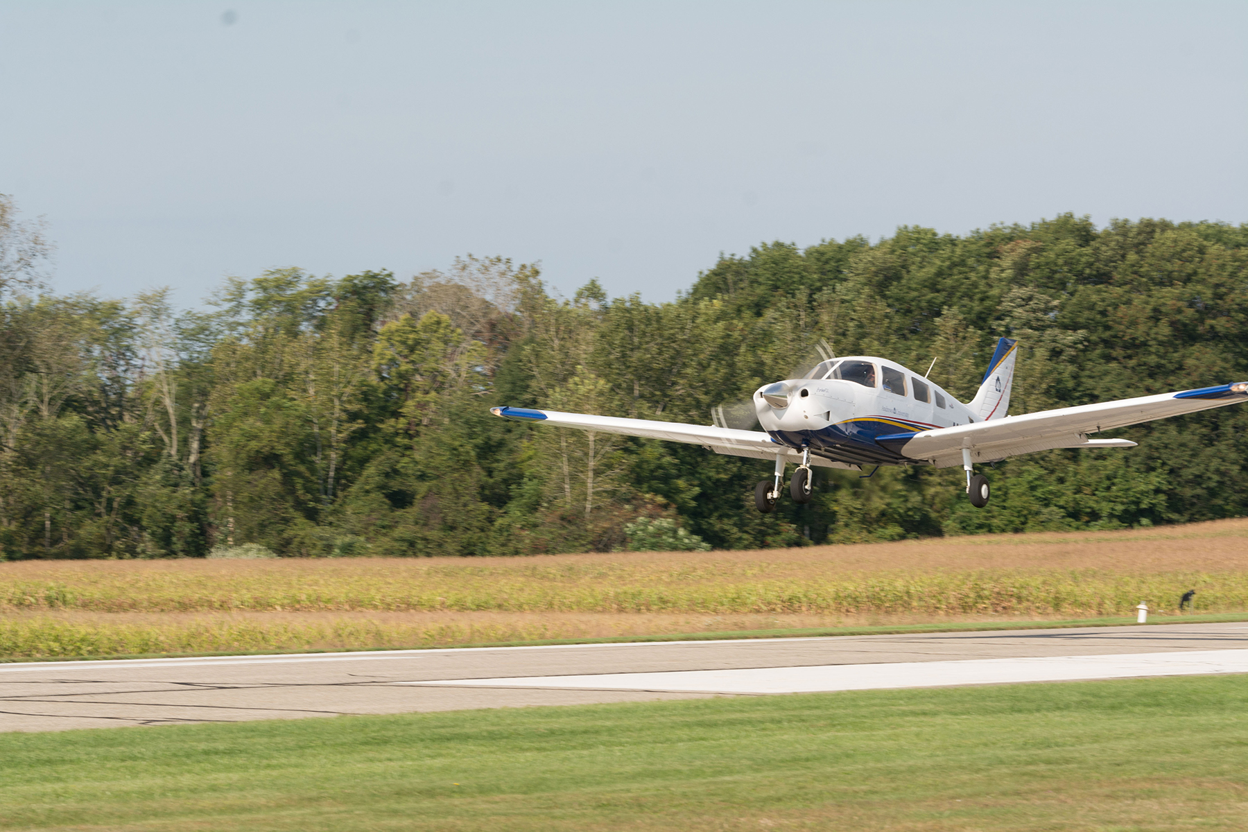 A plane lands at the Andrews University Airpark.