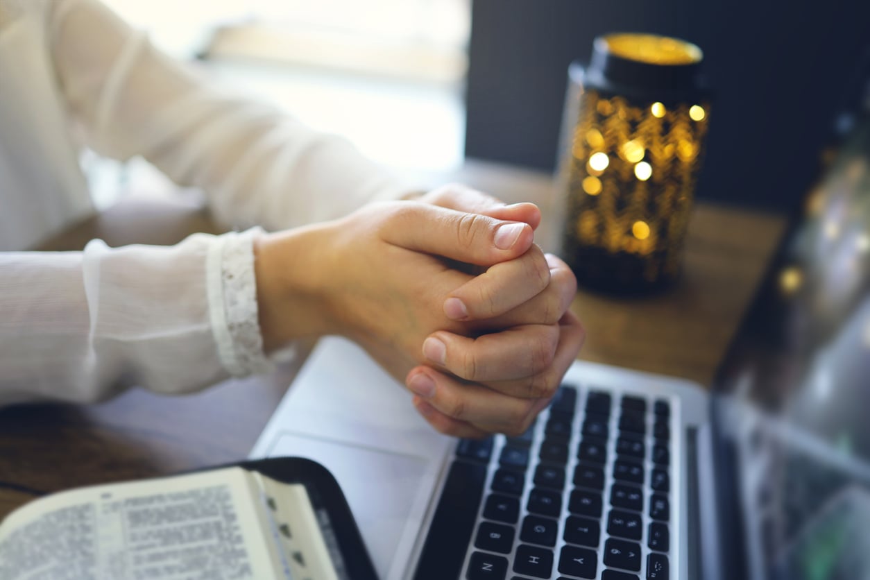 stock photo of online church worshipper