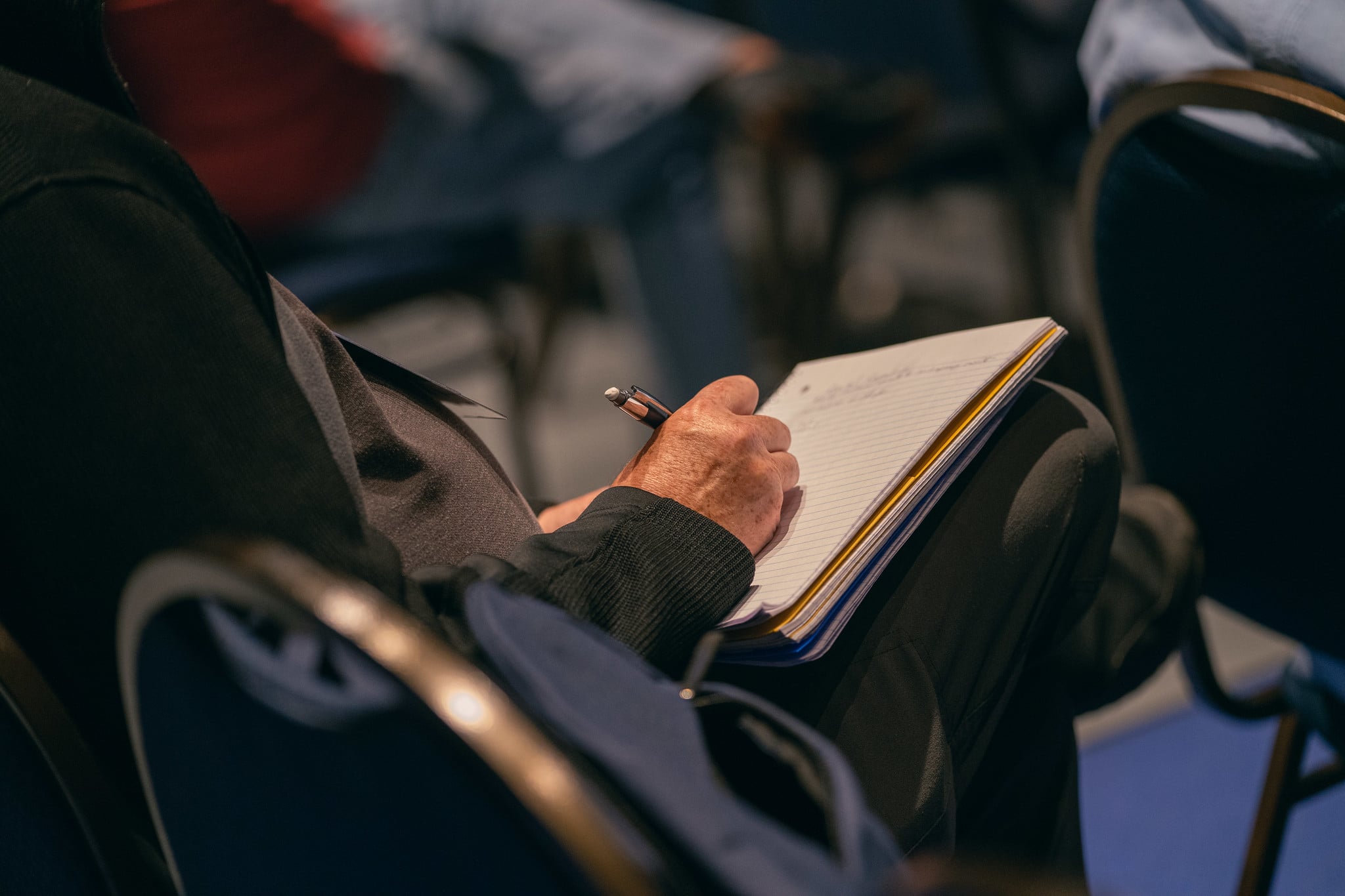 A participant takes notes during one of the Called Convention&rsquo;s many educational seminars. &ldquo;The research done by NAD Ministerial over the last few years leads us to believe that pastors who are proficient in the core qualities, are more likely to be effective in ministry&rdquo; the NAD Ministerial Department says. 