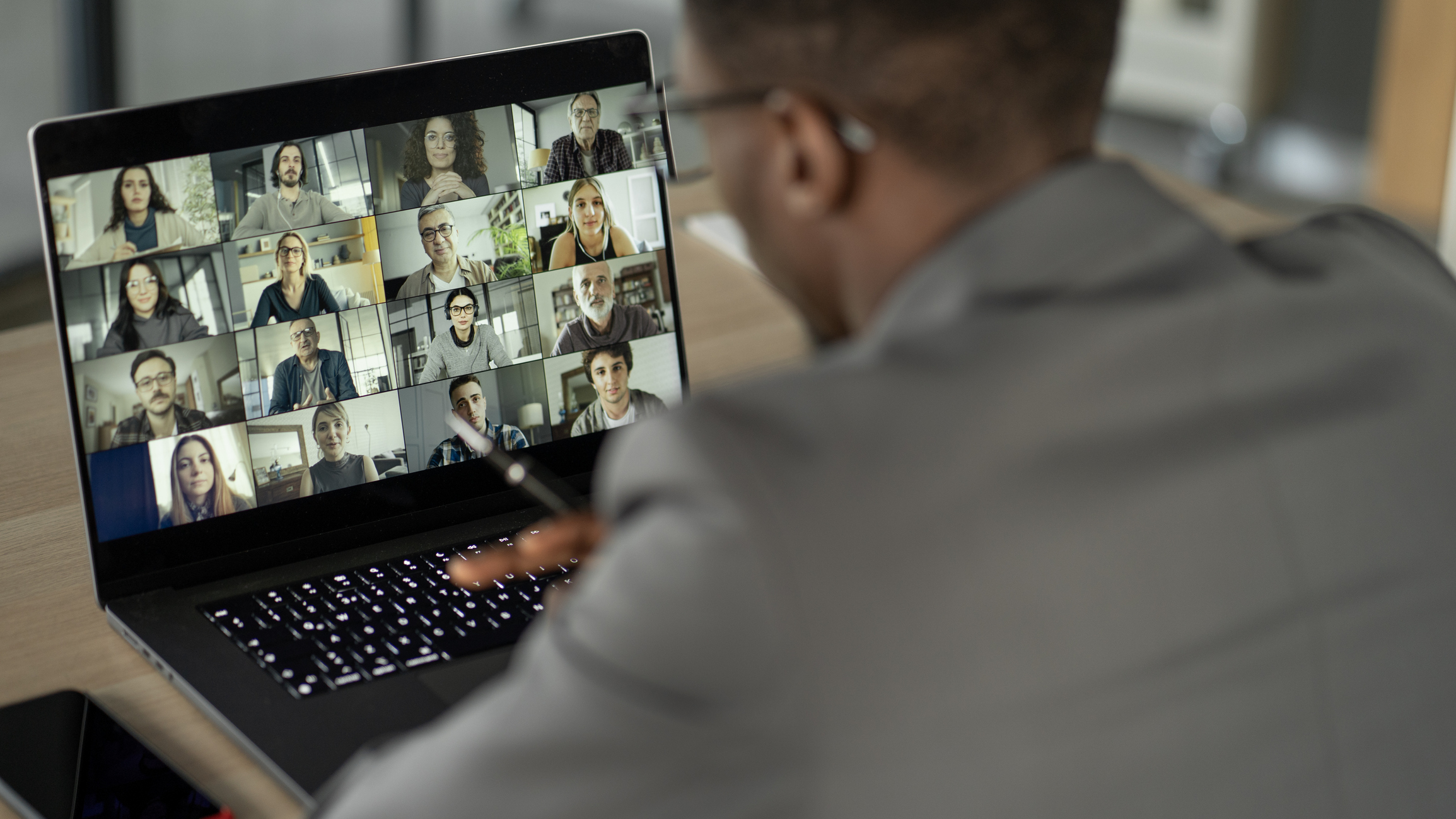 stock photo of young adults in a Zoom meeting