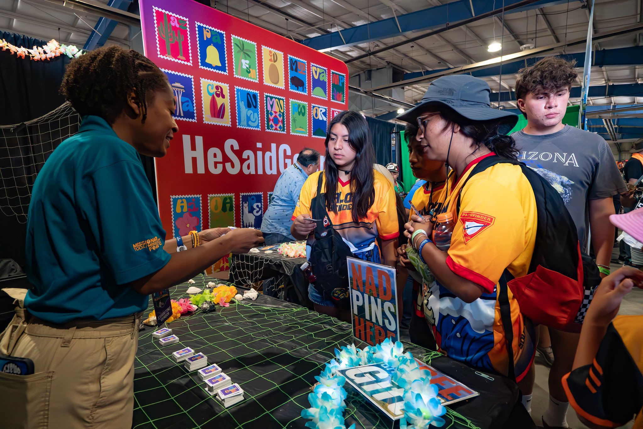 Gladys Guerrero, tutoring and mentorship coordinator for the NAD Office of Volunteer Mission, interacts with Pathfinders during the “Believe the Promise” International Pathfinder Camporee. Photo: Art Brondo