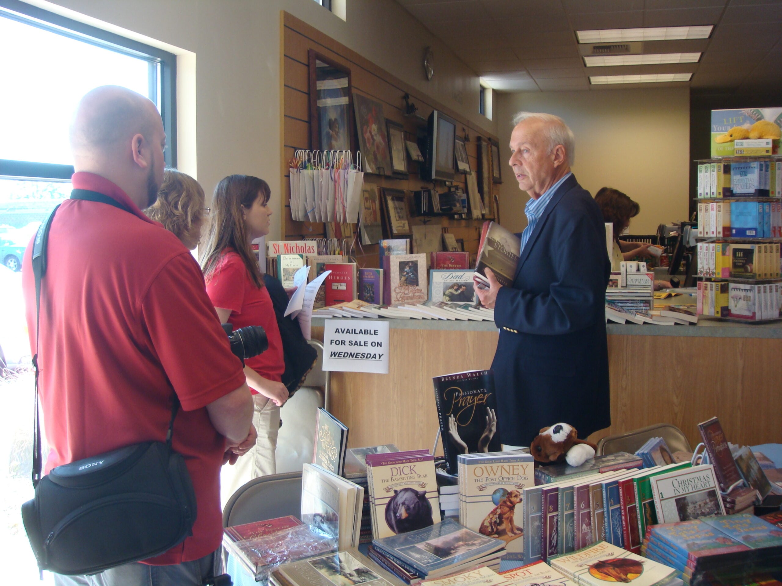 Author and editor Joe Wheeler visits with readers in the bookstore during one of his book signing events. Photo provided by Pacific Press Publishing Association