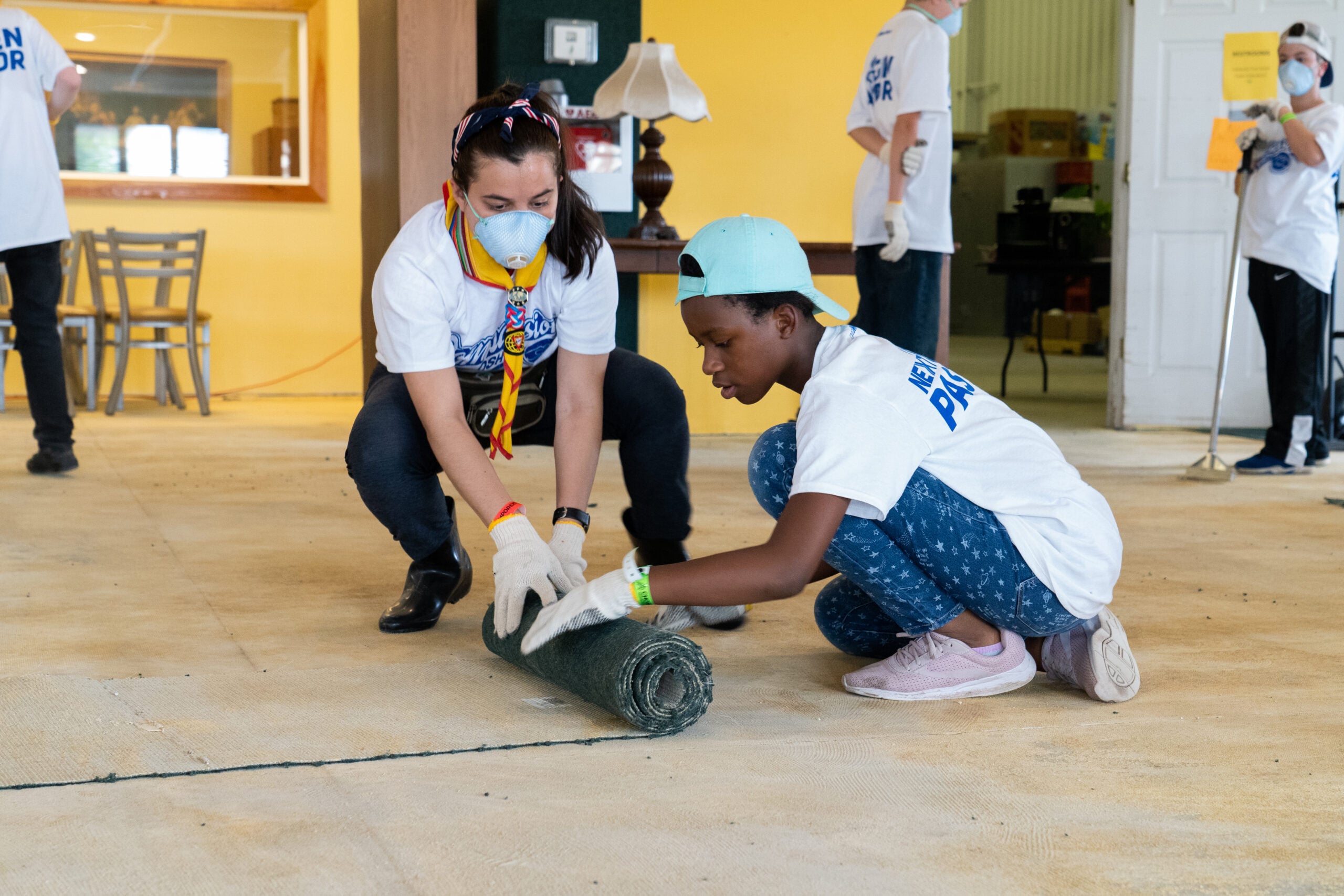 Other clubs learned new skills as they completely removed the old carpet at Father Carr&rsquo;s Food Pantry and helped fix air conditioners at the facility&rsquo;s women&rsquo;s shelter.