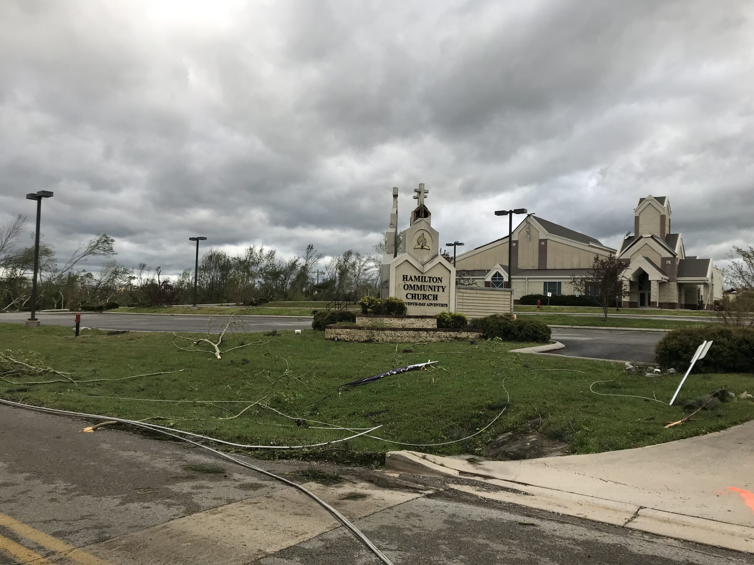 The storm ripped off a wall of the Hamilton Community Church and also made holes in its roof.