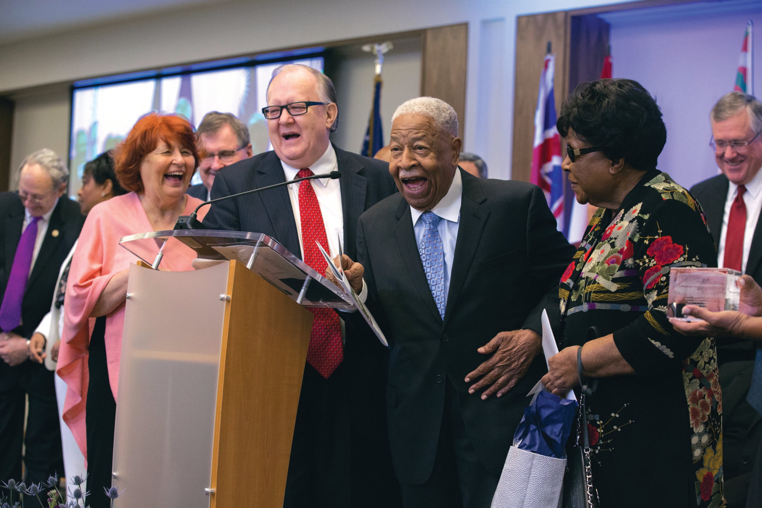 Dan and Donna Jackson present Charles E. Bradford, first and former NAD president, and wife Ethel, with gifts during the NAD headquarters' dedication program on Oct. 26, 2017.