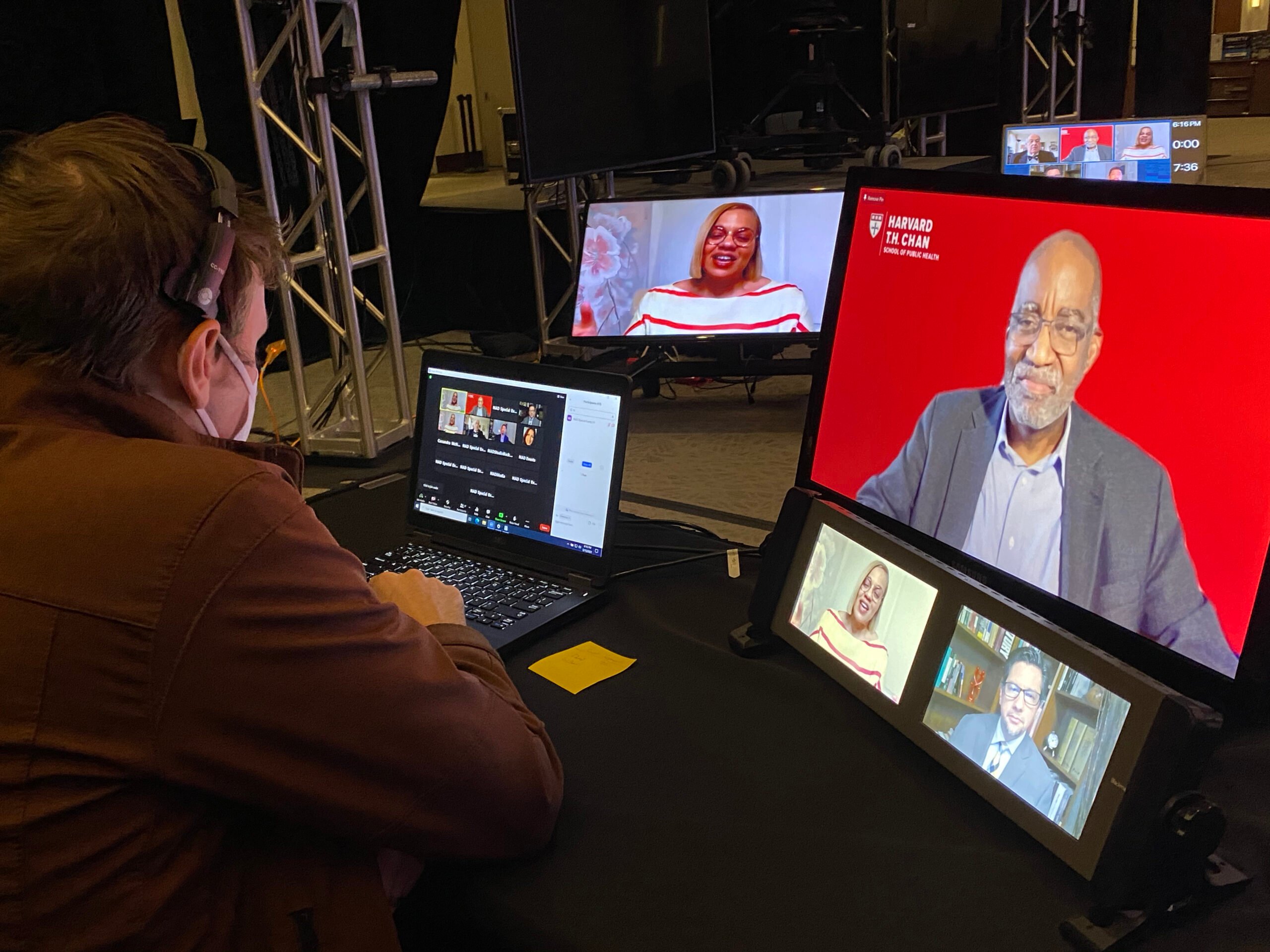 Pieter Damsteegt monitors a feed during the May 15 COVID-19 vaccine symposium a
