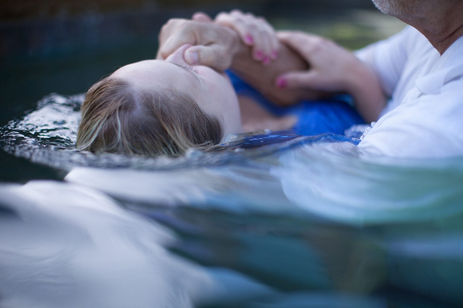 Woman being baptized