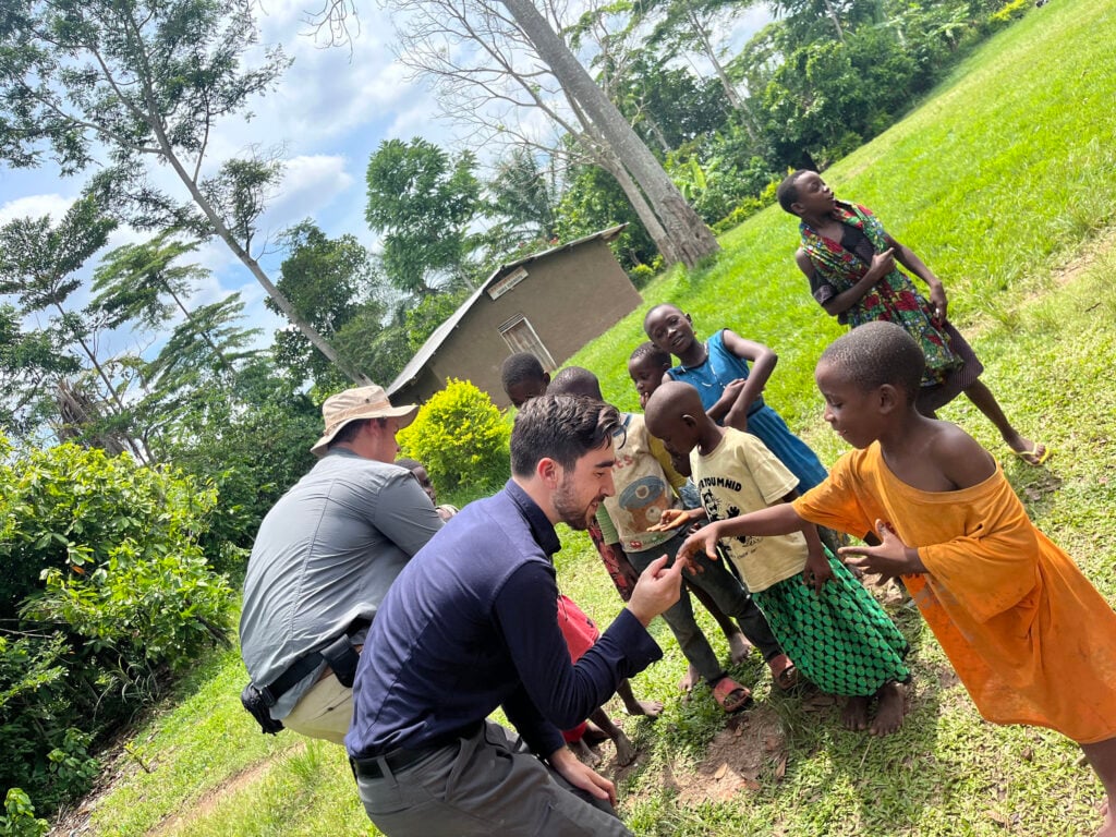 Southern Adventist University students play with children from Uganda
