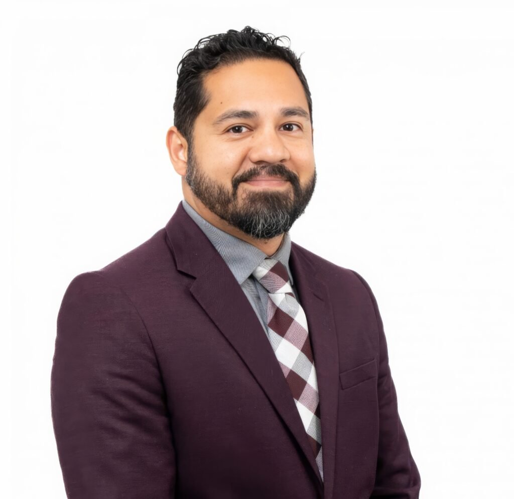 Photo of a man in suit with a white background