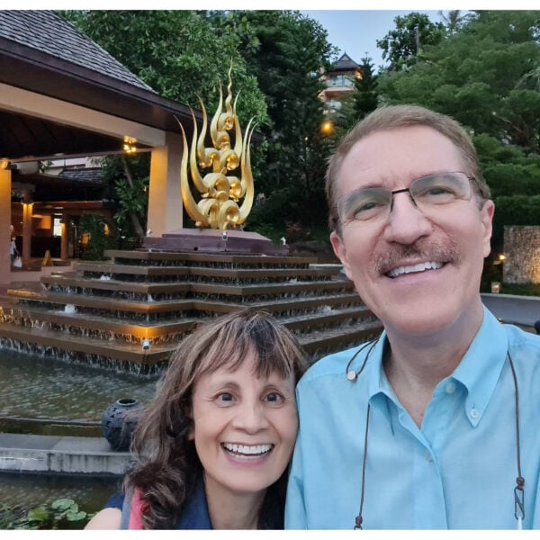 Close-up of a smiling man and woman in Thailand