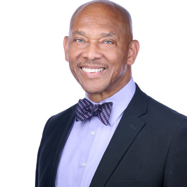 Headshot of a man in a suit
