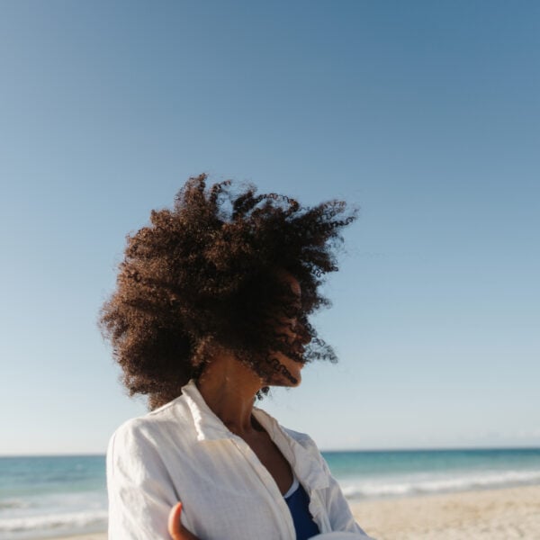 Portrait of a beautiful, smiling African American woman on the beach