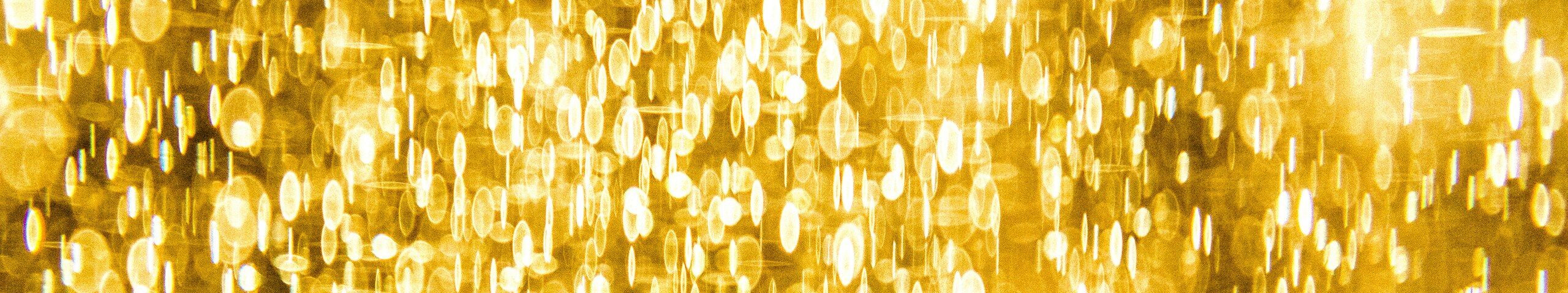 a yellow background with lots of small circles